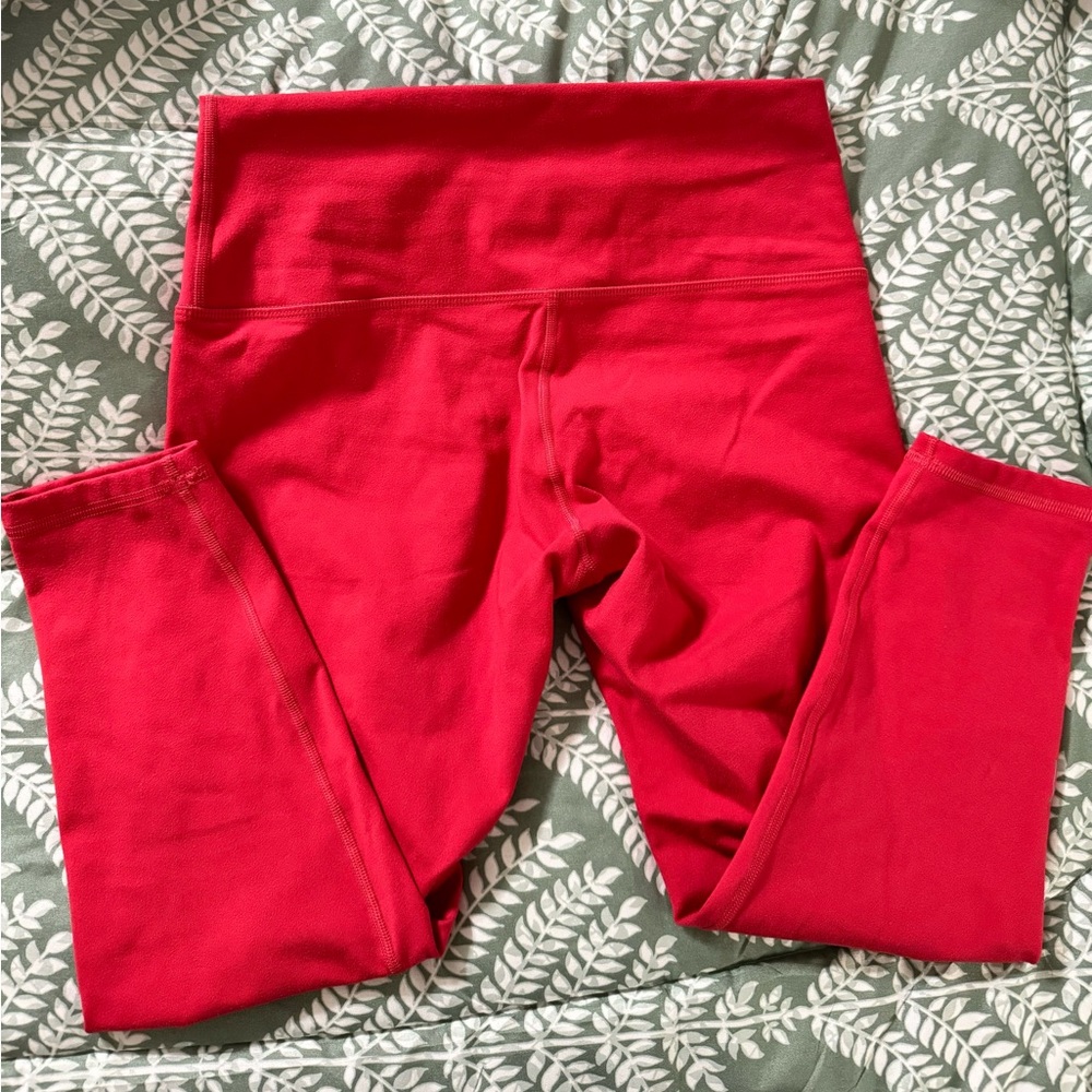 Fleo red leggings bounce material I believe they are crop length size large.